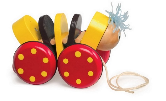 Zabawka na sznureczku. Piesek