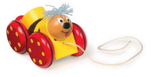 Zabawka na sznureczku. Piesek