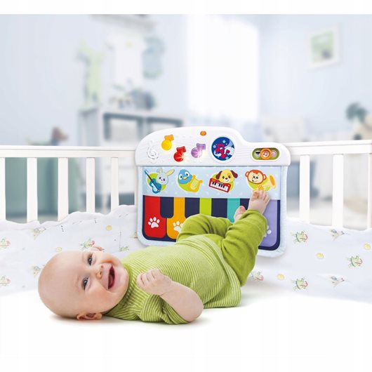 Pianinko na ramę łóżeczka